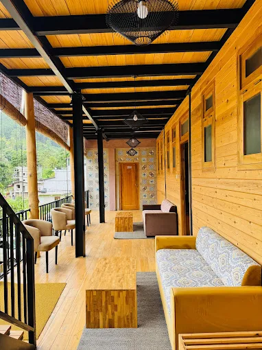 Balcony lounge with mountain views at The Feel Luxury Boutique Hotel Ella